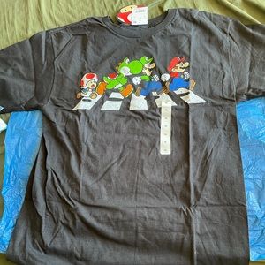 Never worn Boys XL size 14/16 Mario Bros. Shirt